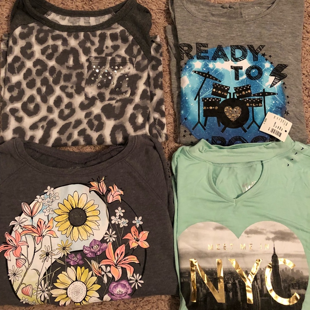 Bundle of four Justice long sleeve shirts.